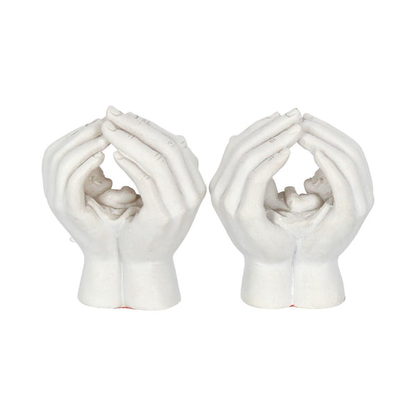 Set of Two Small Shelter 7cm Baby in Cradled Hands Figurines